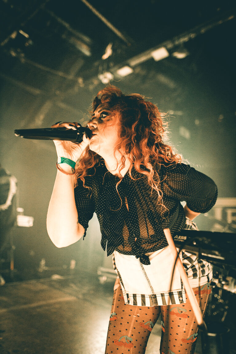 Jayna Doyle singing on stage