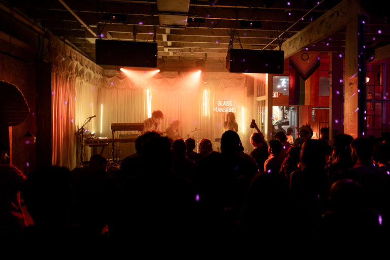 Glass Mansions performing on stage