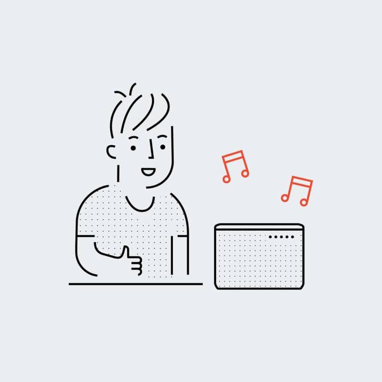 man enjoying music from a speaker man enjoying music from a speaker