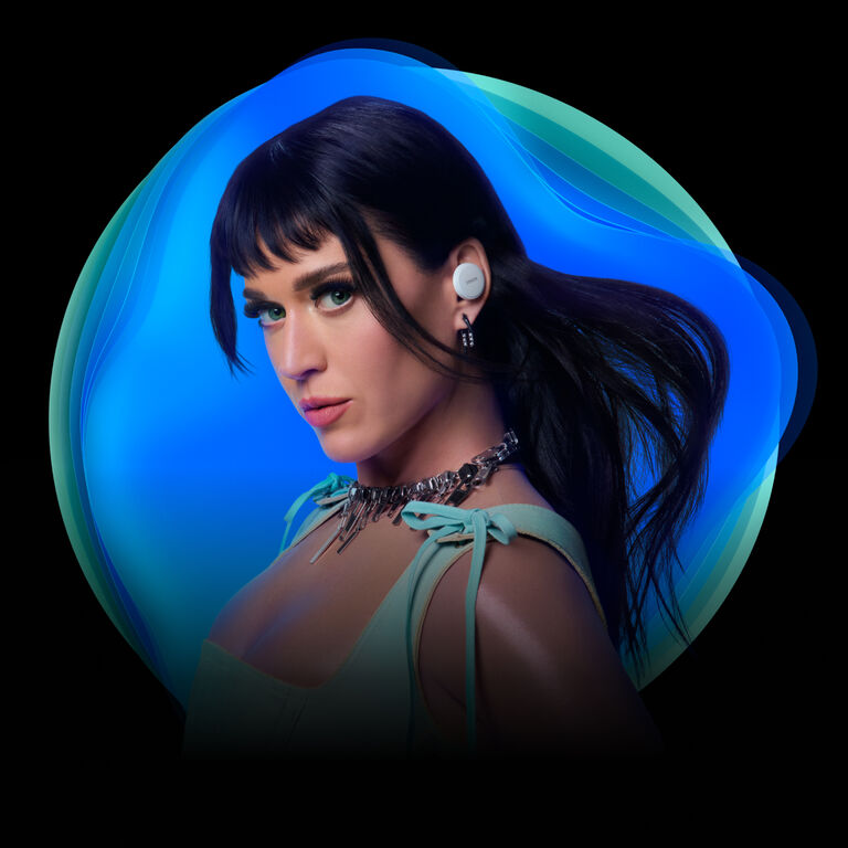 Katy Perry wearing Denon PerL Pro earbuds