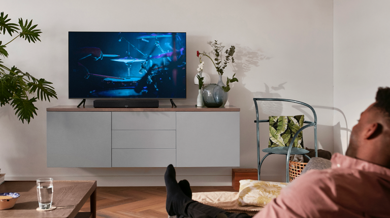 A man watching TV A man watching TV