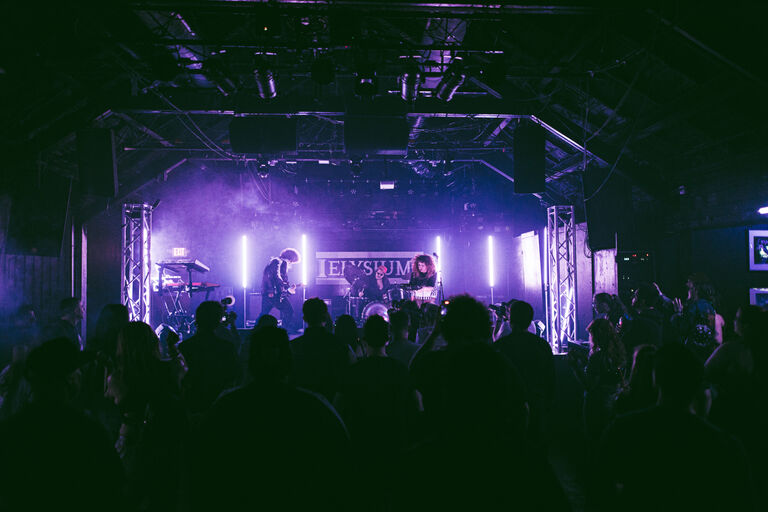 Glass Mansions playing on stage